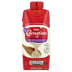 Carnation Milk, Сгущенное молоко без лактозы, 325 мл (11 жидк. унц.) (Товар снят с продажи) 